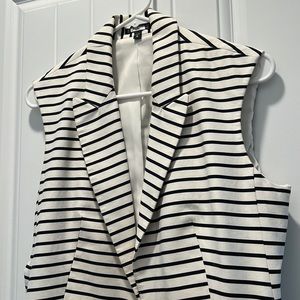 Black and white vest.